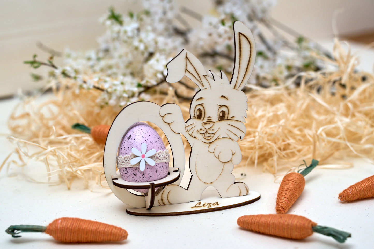 Easter bunnies with an egg basket and name