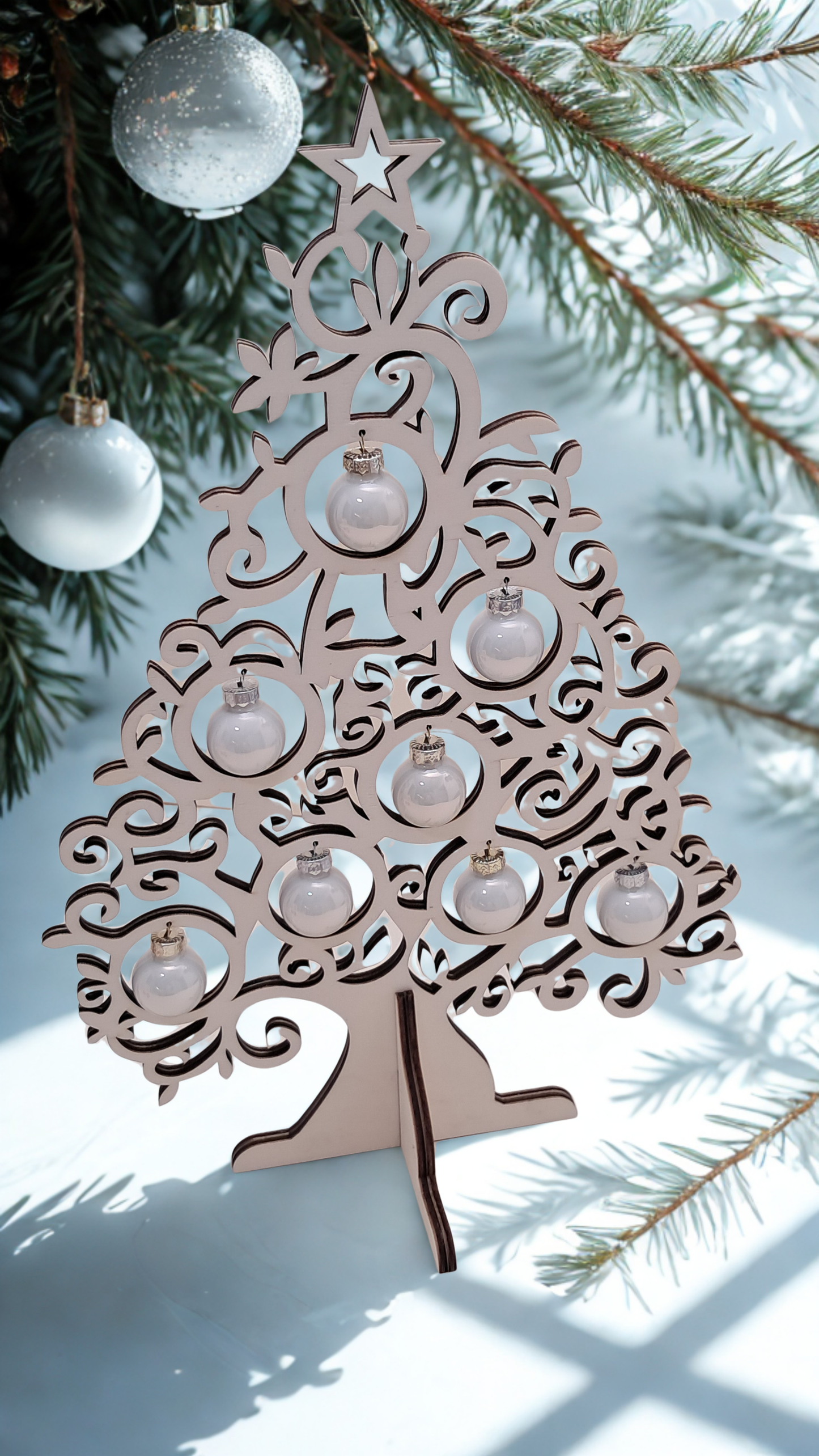 Wooden tabletop Christmas tree with glass baubles